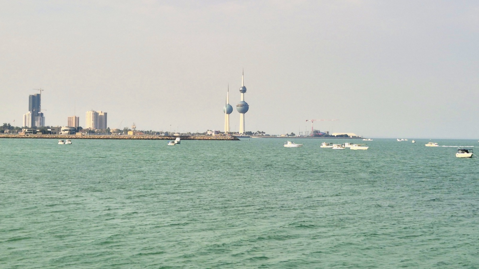 Kuwait Towers rising beside the Gulf waterfront